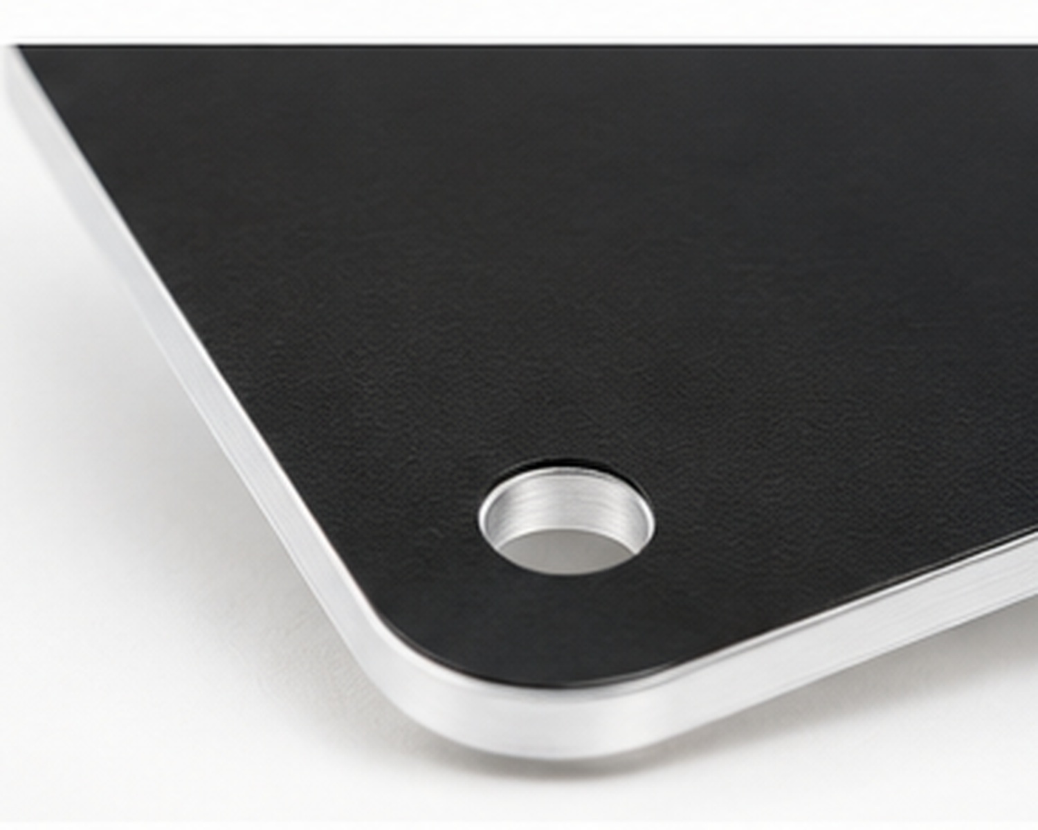 Close-up of a professionally printed aluminum sign showing durable finish and mounting details