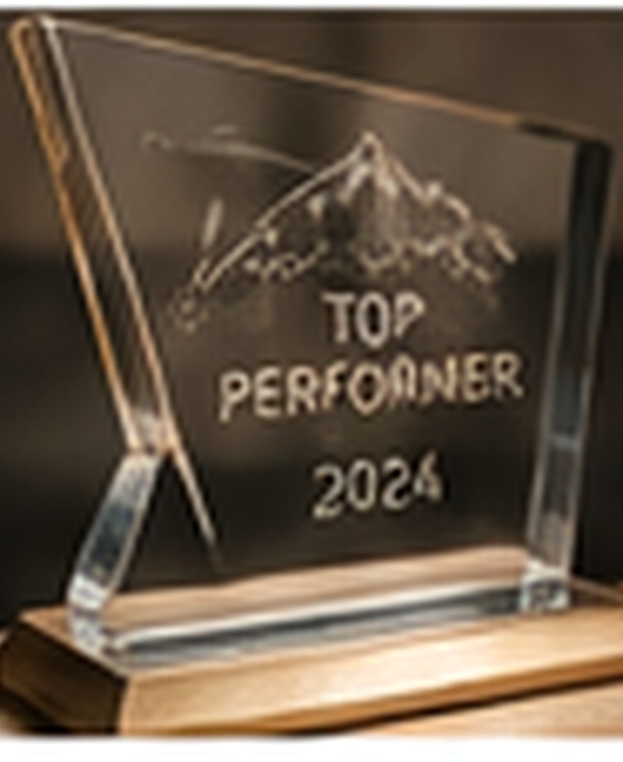 Premium custom engraved awards and plaques arranged in a professional showroom